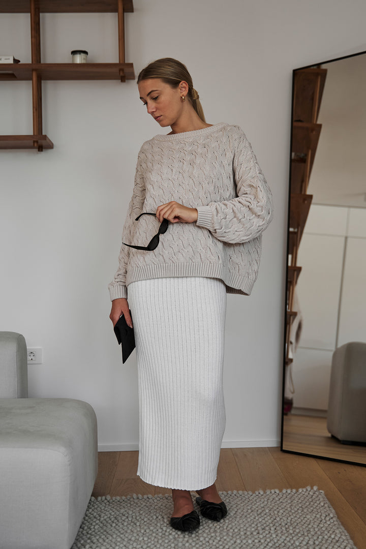 Knitted braid sweater